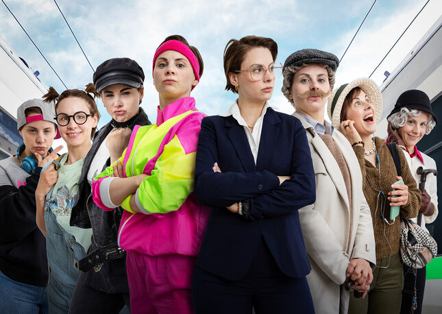 Acht unterschiedliche Personen, die die Vielfalt der Menschen im Nahverkehr darstellen sollen.